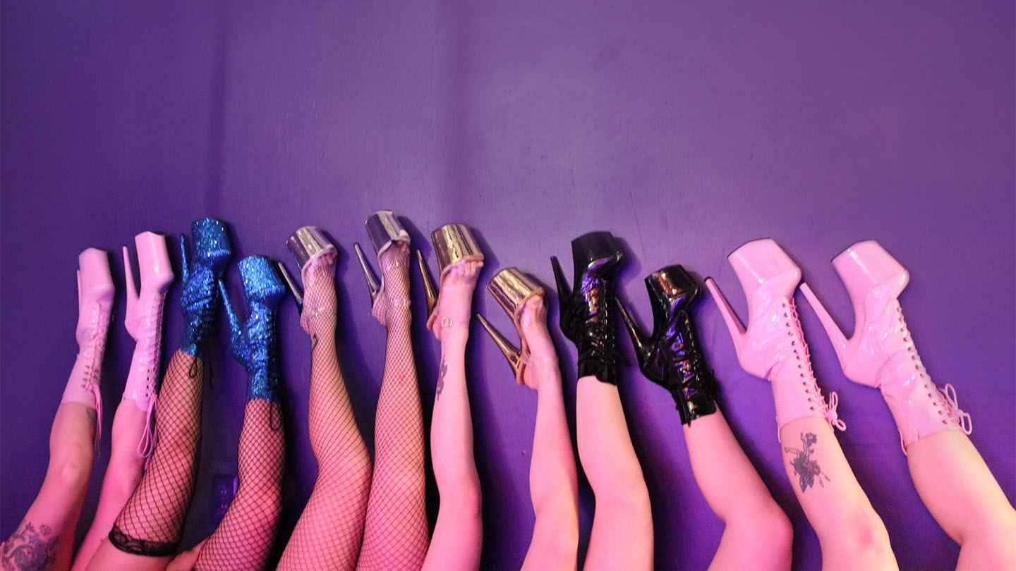 Legs wearing high-heel shoes